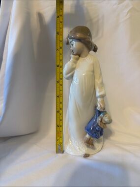 Lladro Porcelain Girl Figurine in White Gown with Blue Doll